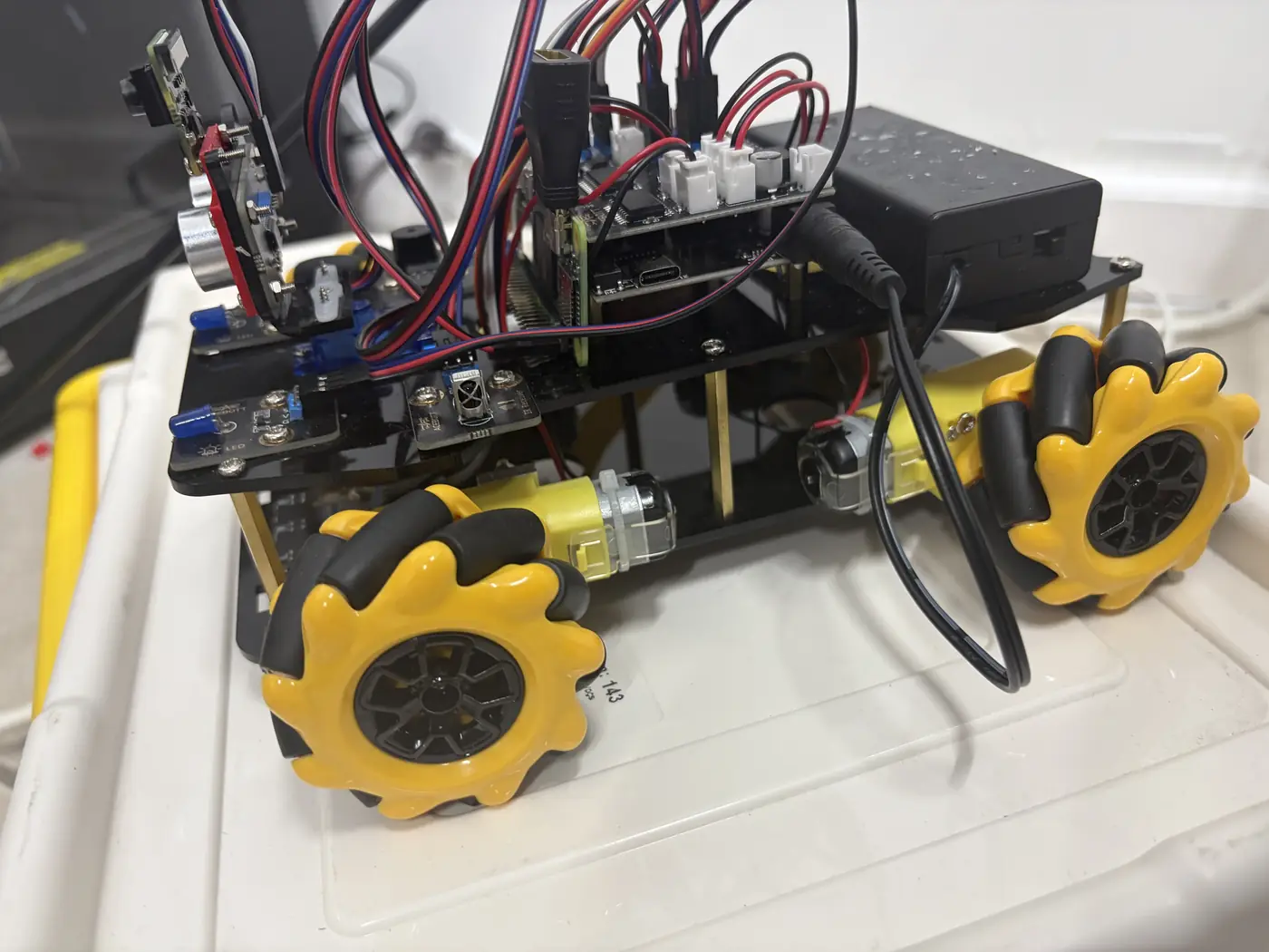 Electronics rover yellow wheel side view